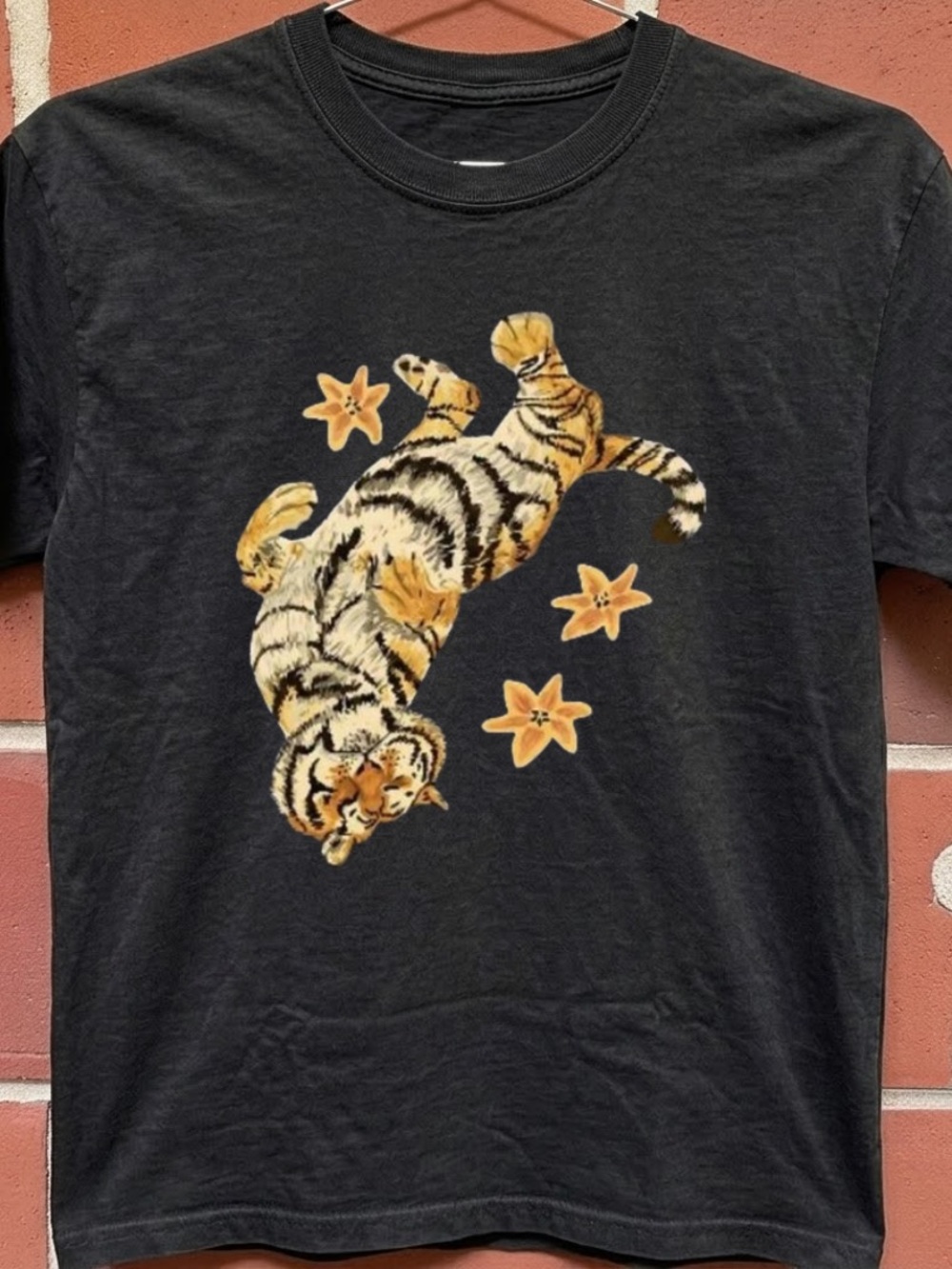Gildan Black Short-Sleeve Tee with Orange Tiger and Starflower Graphic